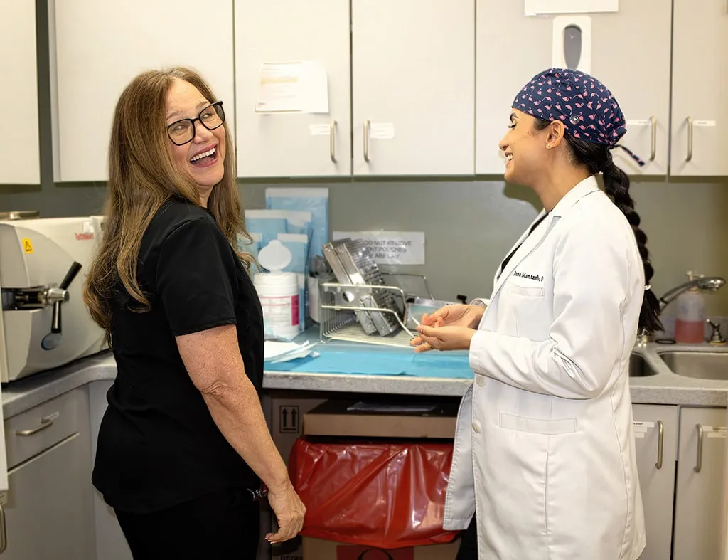 Dentists laughing together